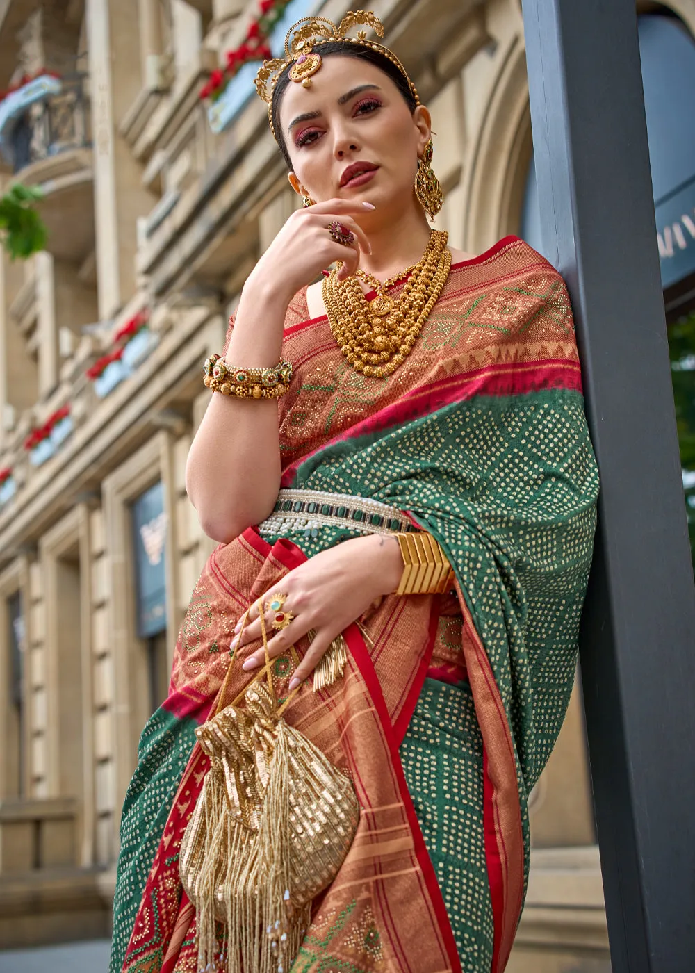 Kasturi Green And Red Printed Patola Silk Saree