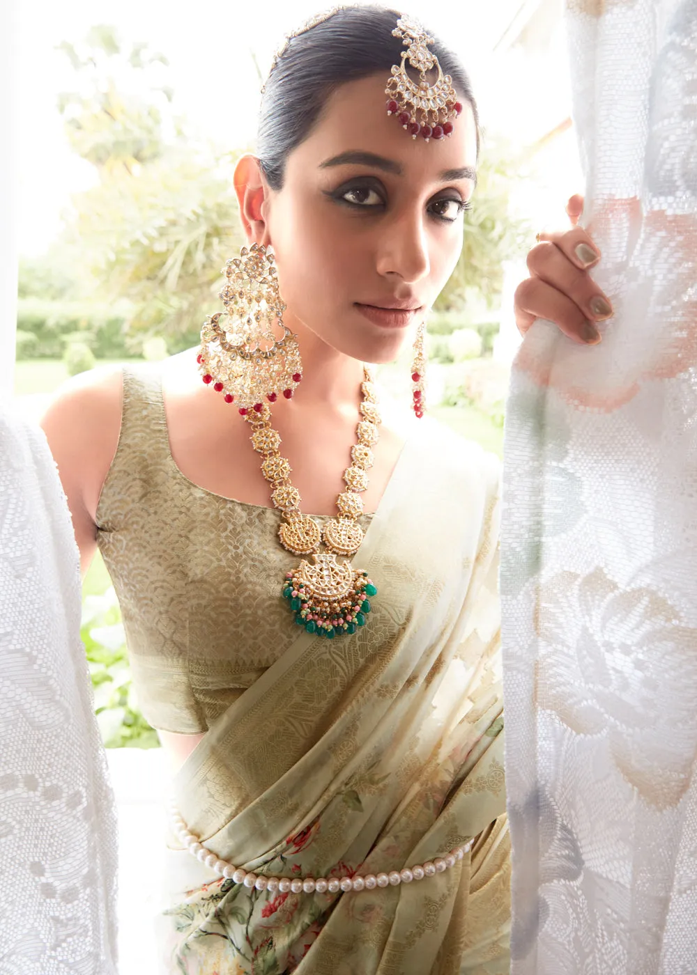 Pista Green Woven Banarasi Silk Saree With Floral Print